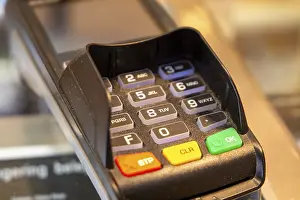 Cashless Payment Concept Stampe: Close-up of a card reader