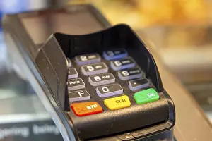 Cashless Payment Concept Stampe: Close-up of a card reader