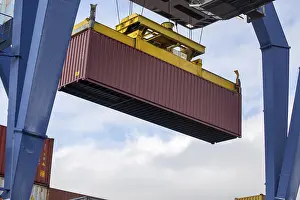 Deserted Harbor Scene Stampe: Close-up of the loading of a shipping container