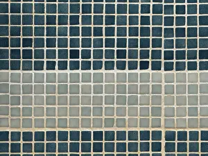 Mosaic Wall Decoration Stampe: A close-up view of a wall featuring a pattern of square tiles