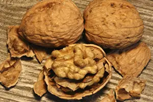 Close Up Walnuts Stampe: Close-up of walnuts on the table
