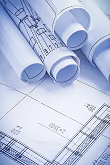 Rolled Up Documents Stampe: Close up view stack of white construction blueprints