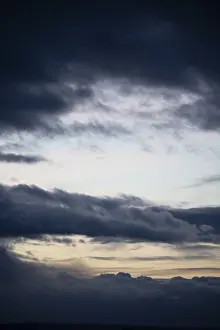 Deserted Evening Sky Stampe: Cloud hole at sunset, bizarre clouds