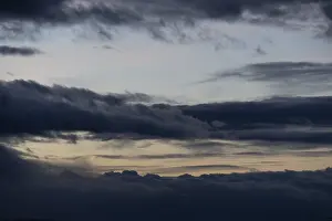 Central Europe Cloud Formation Stampe: Cloud hole at sunset, bizarre clouds