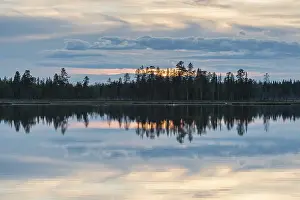 Cloudy Sky Over A Lake Stampe: Cloud reflection in a forest lake