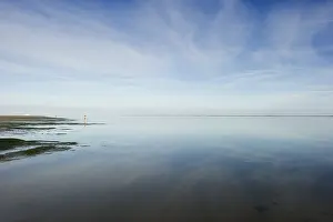 Overcast Sky Waterfront Scene Stampe: Cloud reflection in the mudflats