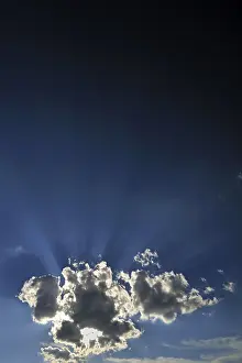 Backlighting In Nature Stampe: Cloud with sun rays