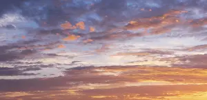 Evening Sun Photography Stampe: Clouds in the evening light at sunset