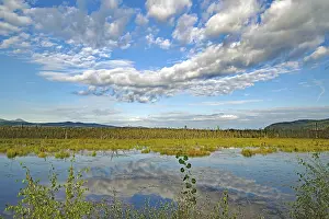 Cloudy Sky Over Lake Stampe: Clouds reflected in a crystal clear