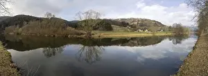 Immagini datate 9 marzo 2024: Clouds reflected river print stubenberg austria