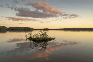 Cloudy Sky Over Lake Stampe: Clouds reflected on the water surface
