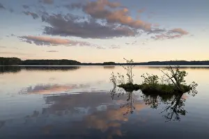 Scandinavian Forest Landscape Stampe: Clouds reflected on the water surface