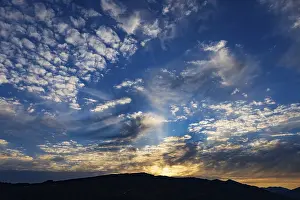 European Cloudy Skies Stampe: Cloudscape of altocumulus clouds at dawn
