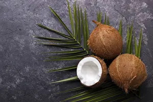 Healthy Eating Photography Stampe: Coconut over black rustic background