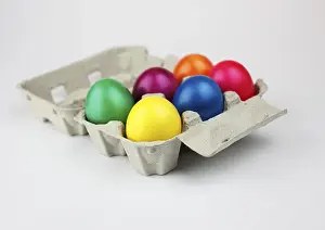 Easter Eggs Stampe: Colourful Easter eggs in an egg box