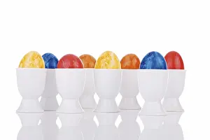 Easter Tradition Images Stampe: Colourful easter eggs in eggcups