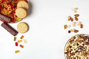 Studio Shot Of Desserts Stampe: Comparison of unhealthy and healthy