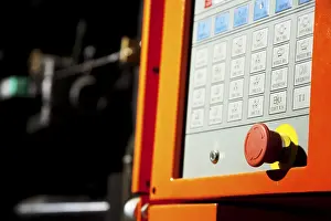 Industrial Building Design Stampe: Complex machine computer control panel with emergency button