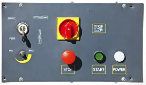 Passenger Transport System Stampe: Complex machine control panel with red buttons and signs