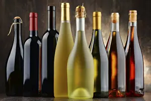 Alcoholic Beverage Arrangement Stampe: Composition with assorted bottles of wine