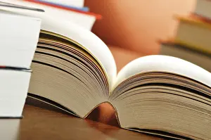 Book Arrangement On A Table Stampe: Composition with books on the table
