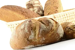 Nutritionally Balanced Meals Stampe: Composition with bread and rolls on kitchen table
