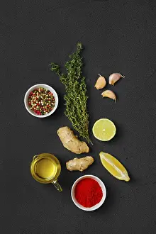 Colorful Vegetarian Dish Stampe: Composition with condiments on black background