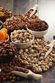 Vegetarian Healthy Eating Stampe: Composition with dried fruits and assorted nuts