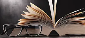 Composition With Open Book Stampe: Composition with open book and glasses on the table