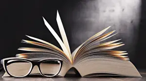 University College Artwork Stampe: Composition with open book and glasses on the table