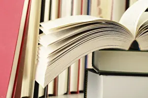 Educational Institution Images Stampe: Composition with stack of books on the table