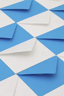 Office Supply Essentials Stampe: Composition with white and blue envelopes on the table