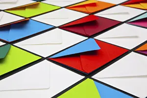 White Envelopes Stampe: Composition with white and colored envelopes on the table