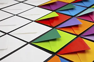 White Envelopes Stampe: Composition with white and colored envelopes on the table