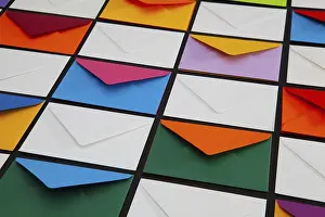 Colorful Envelopes Stampe: Composition with white and colored envelopes on the table