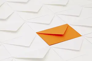 Empty Office Desk Setup Stampe: Composition with white envelopes and one orange envelope on the table