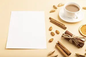 Orange Background Studio Shot Stampe: Composition with white paper sheet