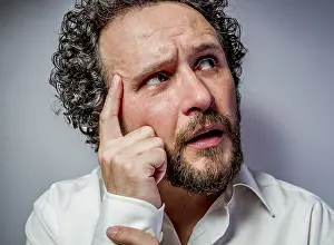 White Background Studio Shots Stampe: Concern for the future, man with intense expression