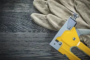 Protective Gloves Stampe: Construction stapler pair of protective gloves