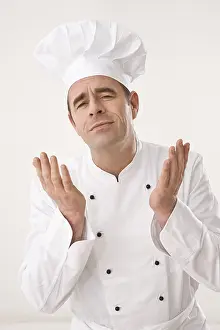 Studio Shot Of A Chef Stampe: Cook gesticulating