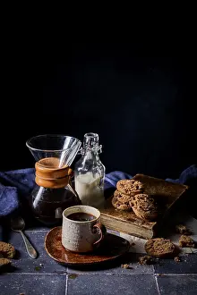 Rustic Coffee Setup Stampe: A cozy setup featuring a rustic ceramic cup of coffee