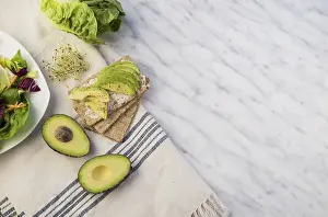 Healthy Nutrition Stampe: Crisp bread with avocado table