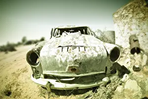 Deserted Passenger Car Stampe: Cross processed image of an old car