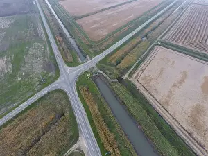 Aerial Landscape Photography Stampe: Crossroads paved roads through the fields