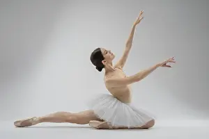 Female Dancer Stampe: A dancer gracefully executes a pose