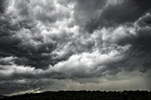 Cloudy Sky Over Europe Stampe: Dark storm clouds, thunderstorms