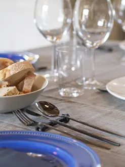 Tabletop Still Life Photography Stampe: Dining table set with bread, cutlery