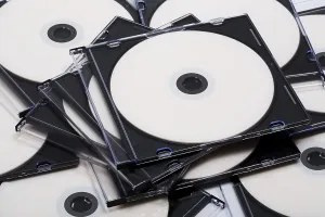 CD Storage Stampe: Disks cd in boxes as a background