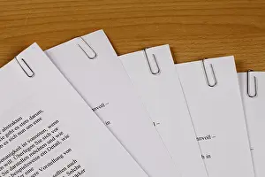 Office Stationery Stampe: Documents held together by paper clips