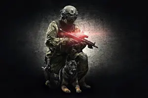 German Shepherd Breed Stampe: Dog handler posing in the studio with a trained shepherd